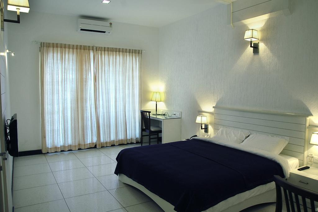 Hotel Blue Waters Kundapur Pokoj fotografie